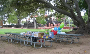 Party supplies on picnic tables at Alameda Park Main Picnic Site