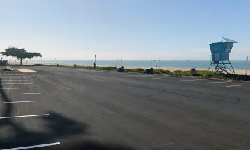 Parking lot beach and lifeguard tower
