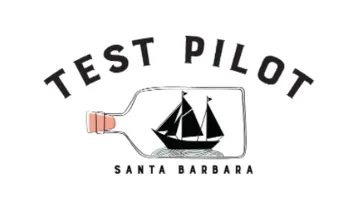 Test Pilot logo featuring a ship inside a bottle