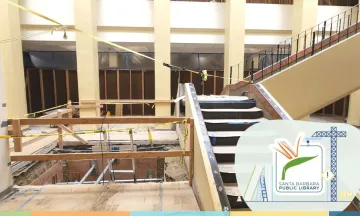 construction showing the demolition of the stairwell and a hole in the ground for the elevator