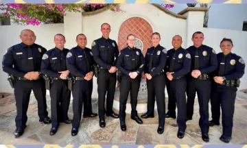 This image shows the 8 newly sworn in Santa Barbara Police Department Officers standing in a line with Chief Kelly Gordon.
