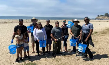 Volunteers clean up Leadbetter Beach. 