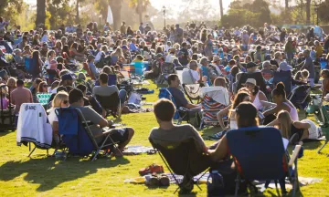 Attendees of Concerts in the Park enjoying live music