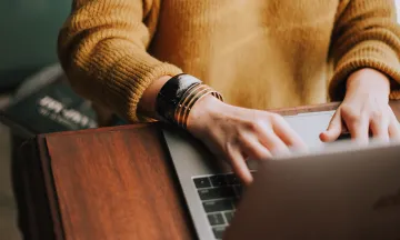 Image of a woman on a laptop