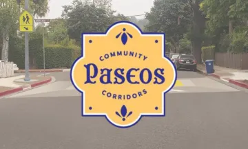 This image shows a neighborhood with a logo that reads "Paseos Project"