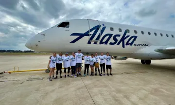 Officers Standing in front of jet