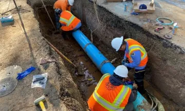 Public Works staff repairs a water main break.