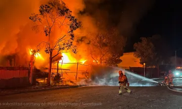 Firefighters extinguish a large structure fire on 700 East Carpinteria St