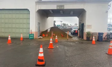 Image of a pile of sand at the City's sand bag station