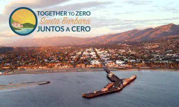 View of Stearns Wharf and Santa Barbara with "Together to Zero" logo 