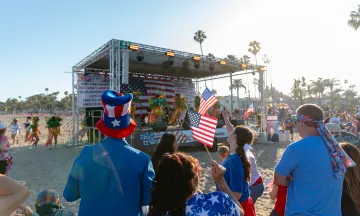 Community members celebrate Independence Day at the West Beach bandstand