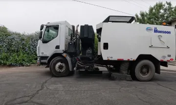 street sweeper vehicle on a residential road
