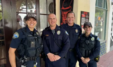 Four Officers Standing in front of Restaurant Yona Redz