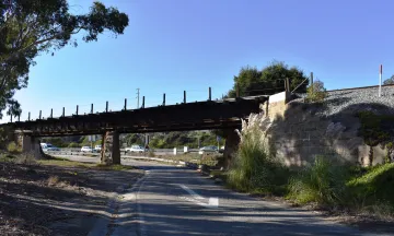 Photo of the historic Los Patos Union Pacific Railroad Bridge facing the US 101 Freeway offramp 