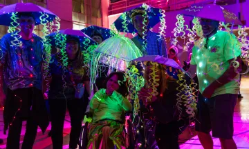 Participants dressed in a group costume as jelly fish pose for the camera