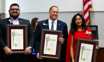 Councilmembers Oscar Guiterrez, Mike Jordan, and Wendy Santamaria holding their Certificate of Election.