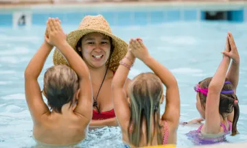 Instructor leading a swim lesson at the Ortega Park Pool.
