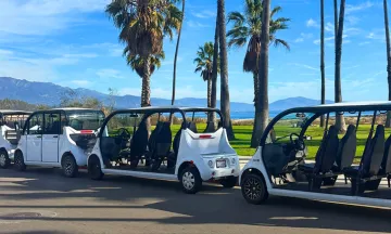 Three State Street Loop golf carts parked along Cabrillo Blvd.