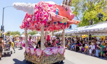 Flying Pig in front of the VIP sections of the parade. Courtesy: Summer Solstice Celebration.