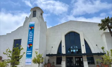SBA termina with “Fly with Pride, Land with Love” banner.