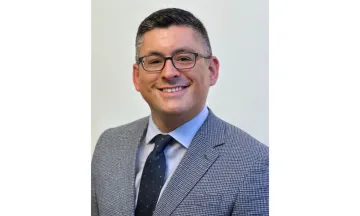 Anthony Valdez smiling 