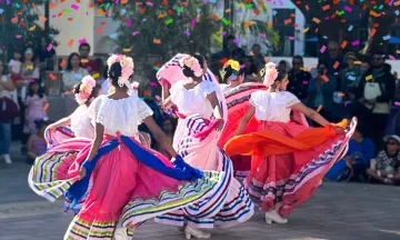Raices y Suenos 2024_Dancers in coloful folklico dresses.