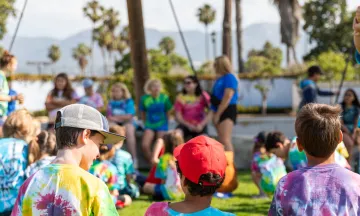 Campers at Nature Camp gather in their handmade tie dye shirts