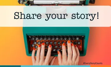 Hands typing on a typewriter
