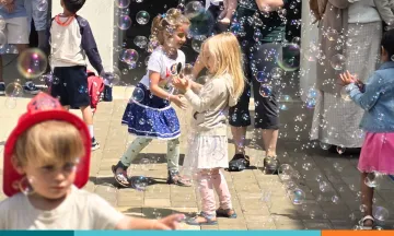children play in bubbles at santa barbara public library