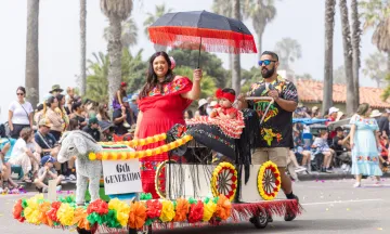 A family and their handmade float at the Children’s Fiesta Parade.