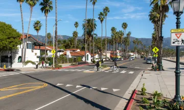 Bikers crossing the intersection at Cabrillo Boulevard