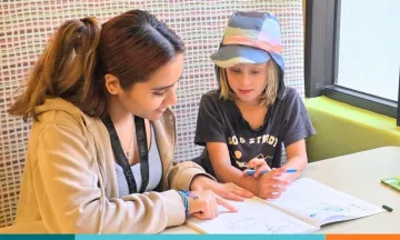 Literacy Volunteer in the Library