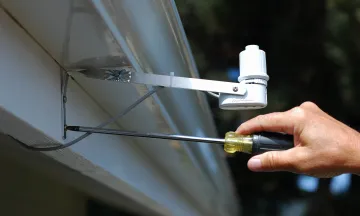 Rain sensor being installed