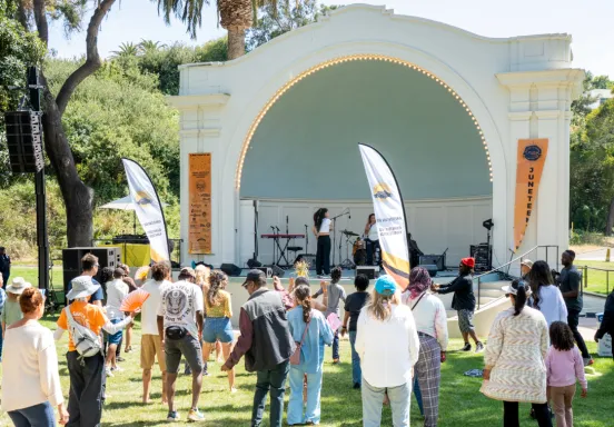 Attendees at the 2025 Juneteenth SB Band Shell dancing and listening to music.