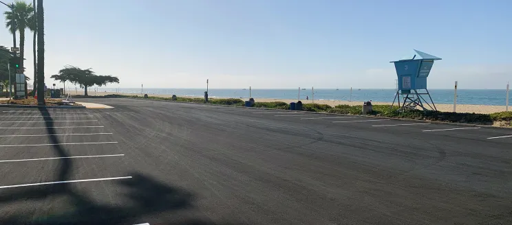 Parking lot beach and lifeguard tower