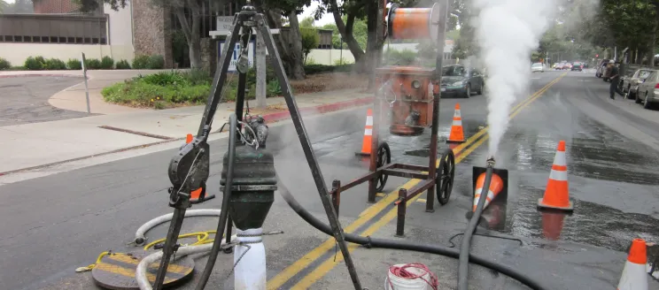 Equipment on the street used for wastewater main rehab
