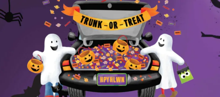 Two animated ghosts standing on either side of a car trunk filled with candy