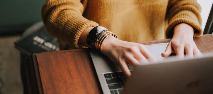 Image of a woman on a laptop