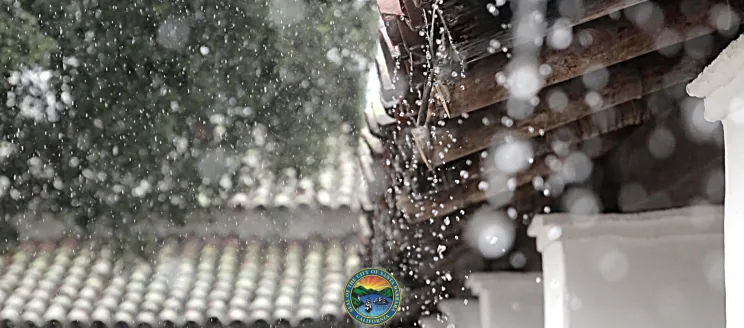 Image of rain splattering off historic Santa Barbara building