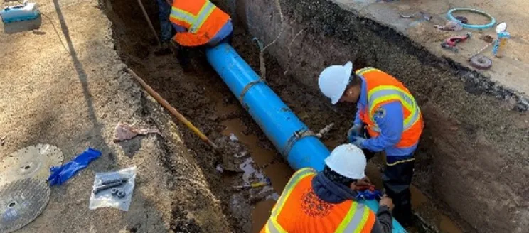 Public Works staff repairs a water main break.