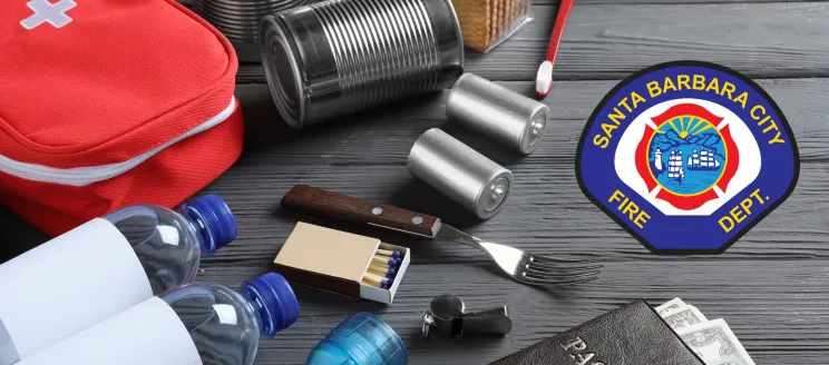 Image shows a collection of items you would want to have in your Disaster Kit like first aid, a flashlight, water and cash - with the Fire Dept logo