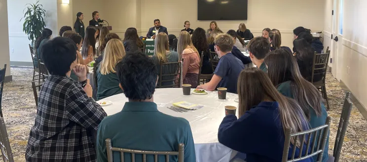 Students at the 2023 Youth Speak Out event listen carefully to one another