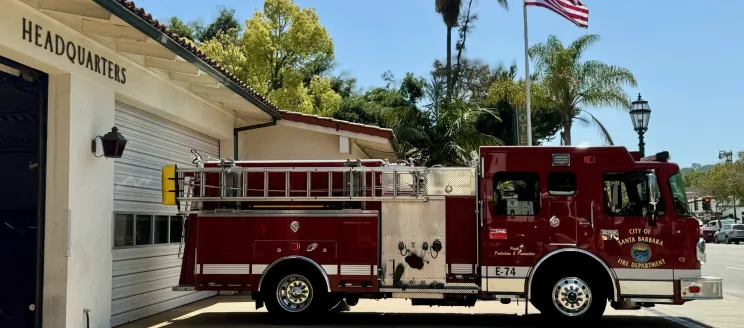 Santa Barbara City Fire Department Fleet Fire Truck at Headquarters with American Flag in the backgrpund