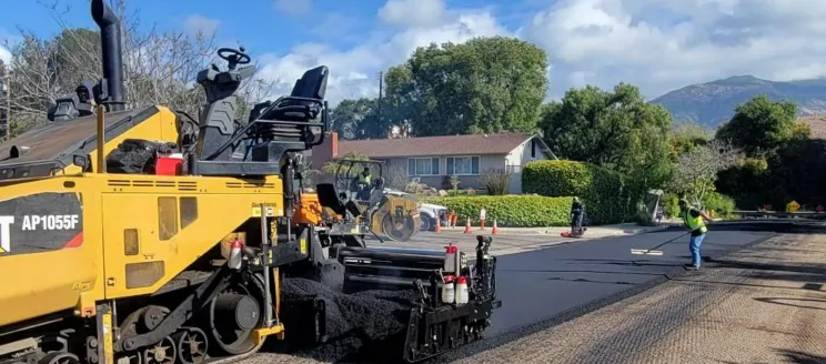 Paver and crew member.