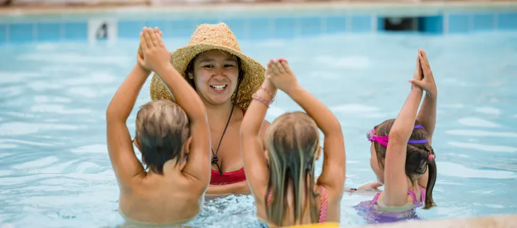 Instructor leading a swim lesson at the Ortega Park Pool.