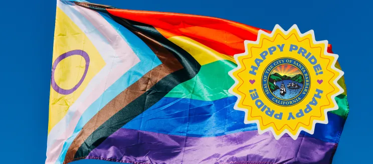 Progress Pride Flag with Happy Pride text and City seal.