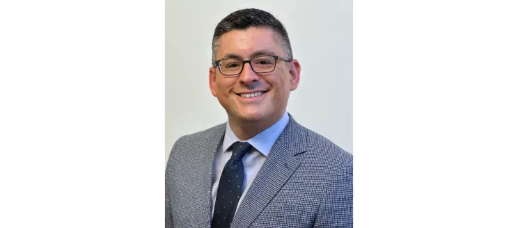 Anthony Valdez smiling 