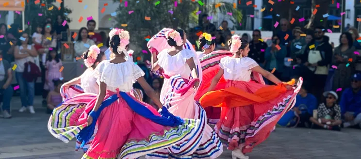Raices y Suenos 2024_Dancers in coloful folklico dresses.
