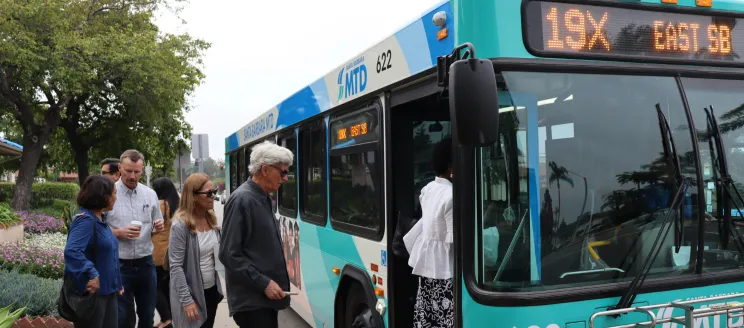 Passengers boarding the Santa Barbara MTD 19X Express Bus.