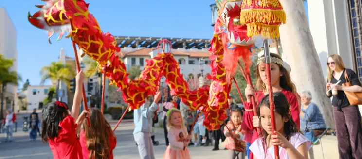 Children holding a Chinese dragon